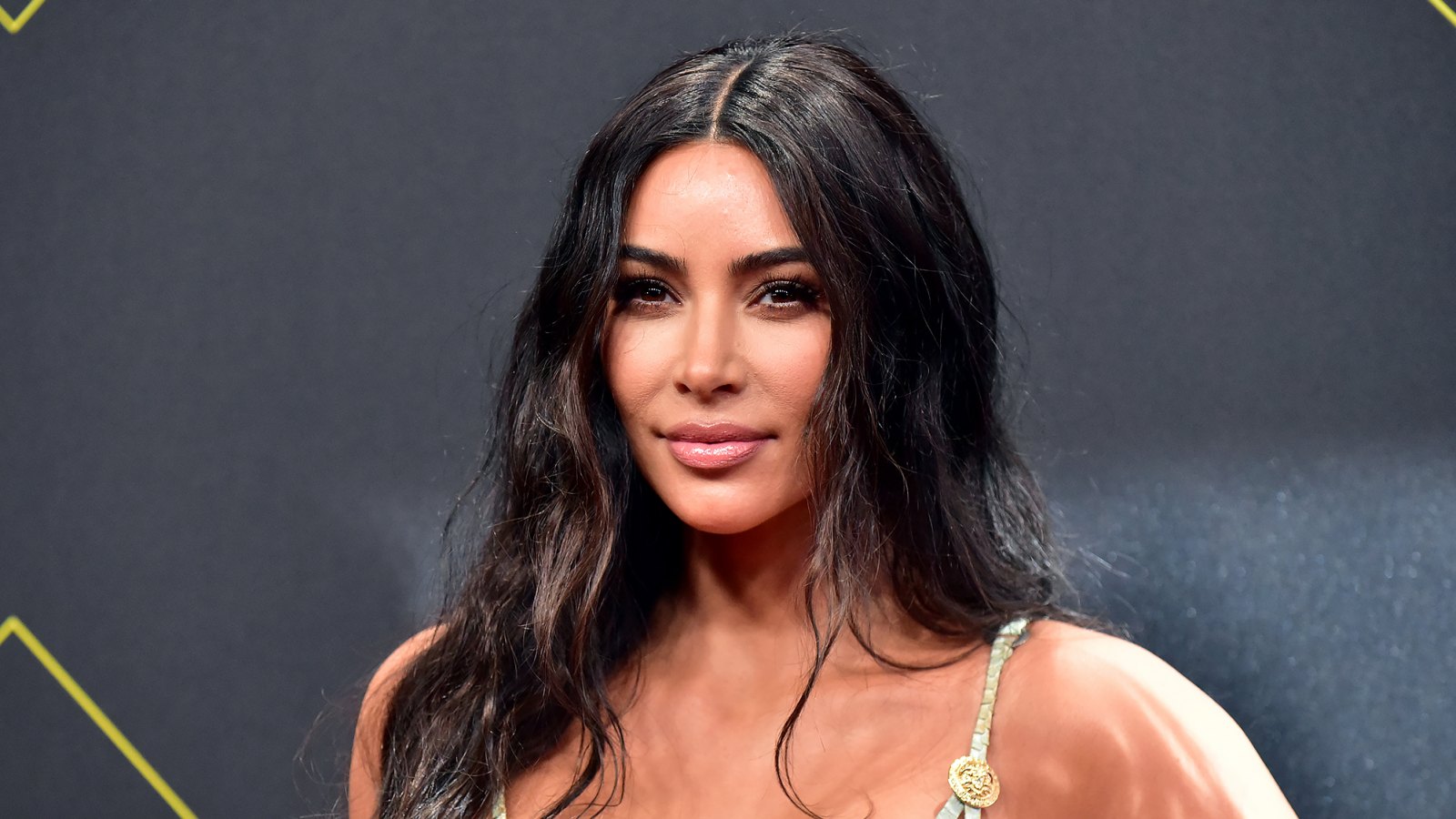 Kim Kardashian Keeps Kendall Jenner's 818 Tequila Safe After Wiping Out on a Wakeboard