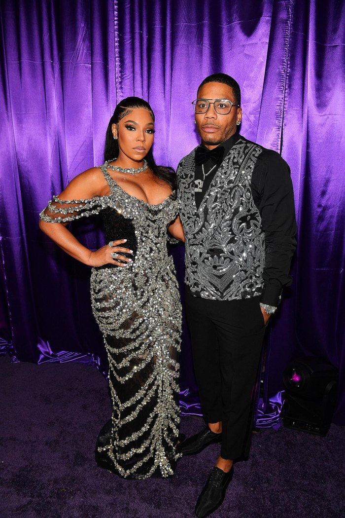 ashanti wears purse with nelly s face on it 516 Ashanti and Nelly