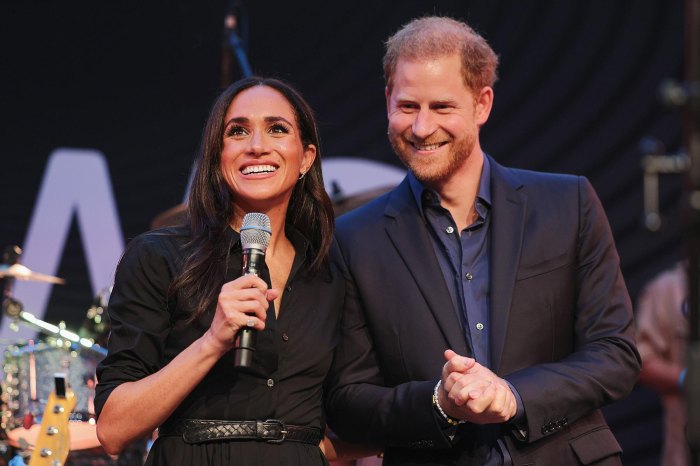 Proud Meghan Markle Joins Prince Harry at Invictus Games Jokes She s A Little Late 375