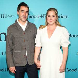 Amy Schumer and Husband Chris Fischer Hold Hands During Red Carpet Date Night