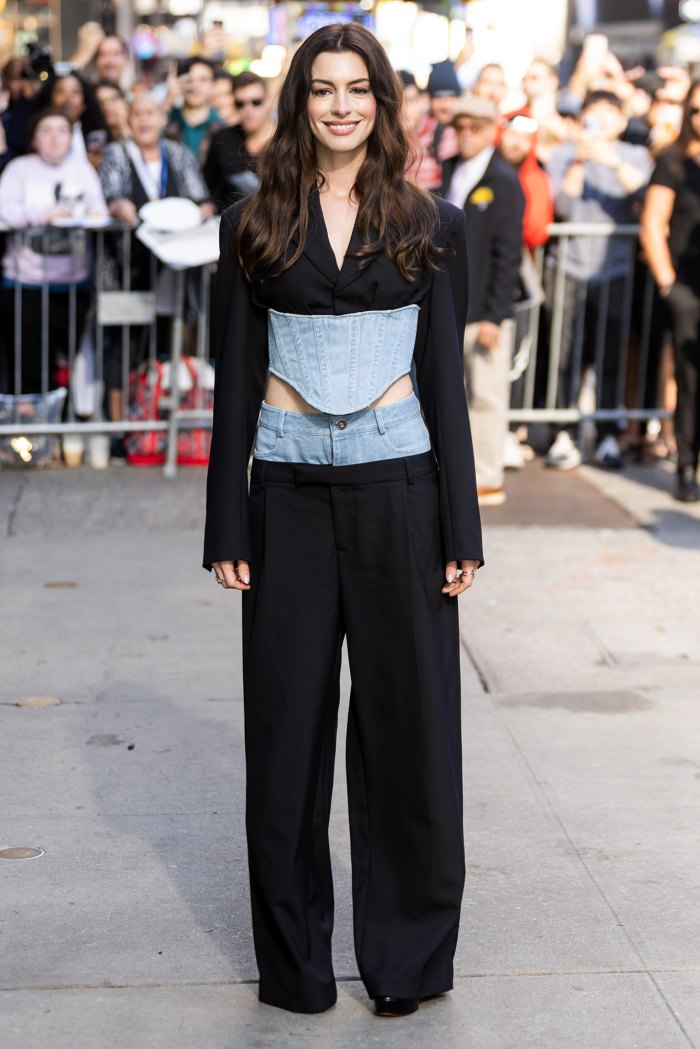 Anne Hathaway Steps Out In Denim Pantsuit To Promote New Movie