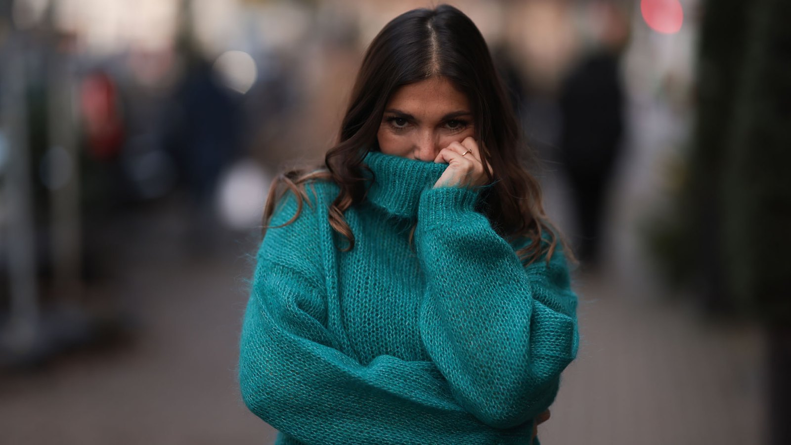 Woman in cozy turtleneck sweater