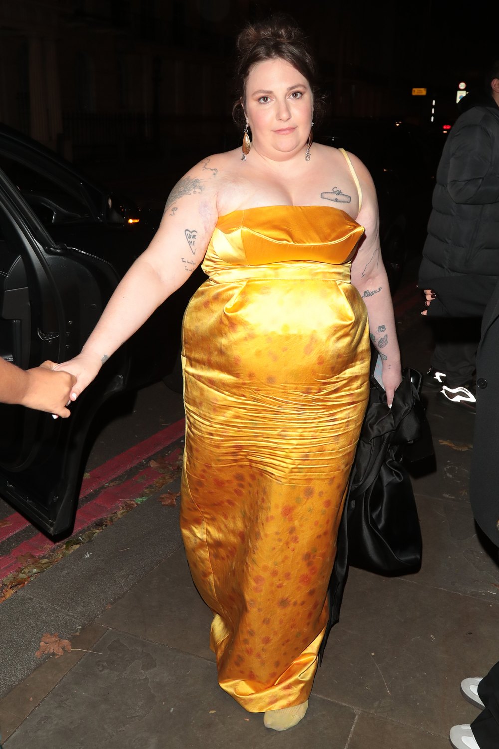 Lena Dunham Ditches Shoes, Wears Just Socks at Glamour Women of the Year Awards