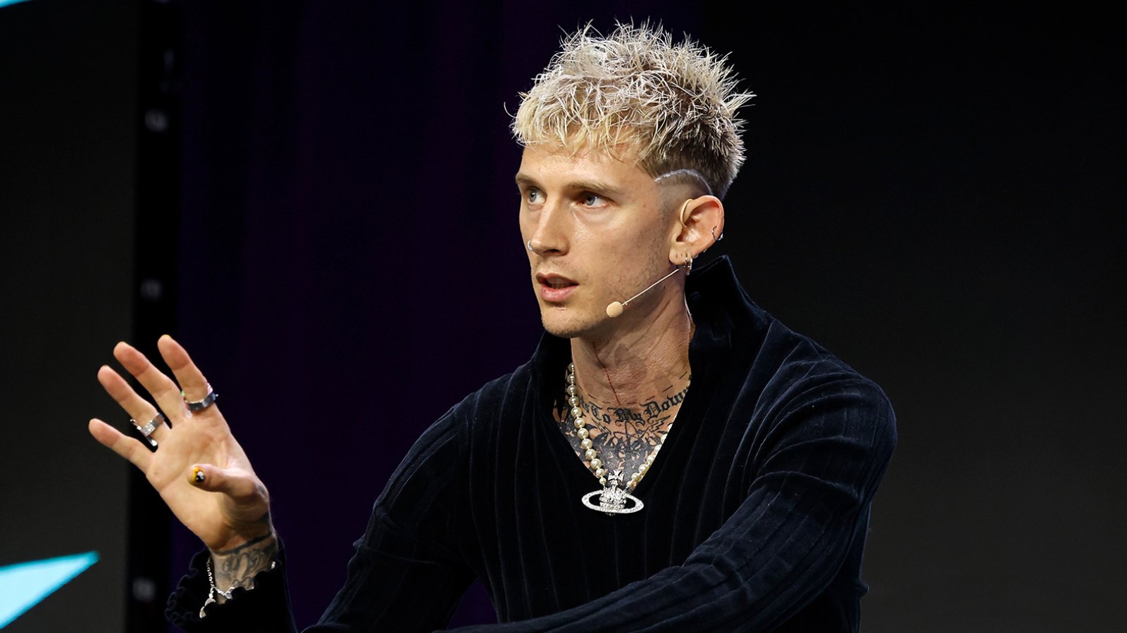 Machine Gun Kelly Apologizes For ‘Primal’ Reaction After a Fan Storms the Stage: 'Get the F--k Away'