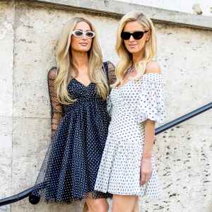 Paris Hilton and Nicky Hilton Share Sweet Sister Moment in Matching Dresses in France