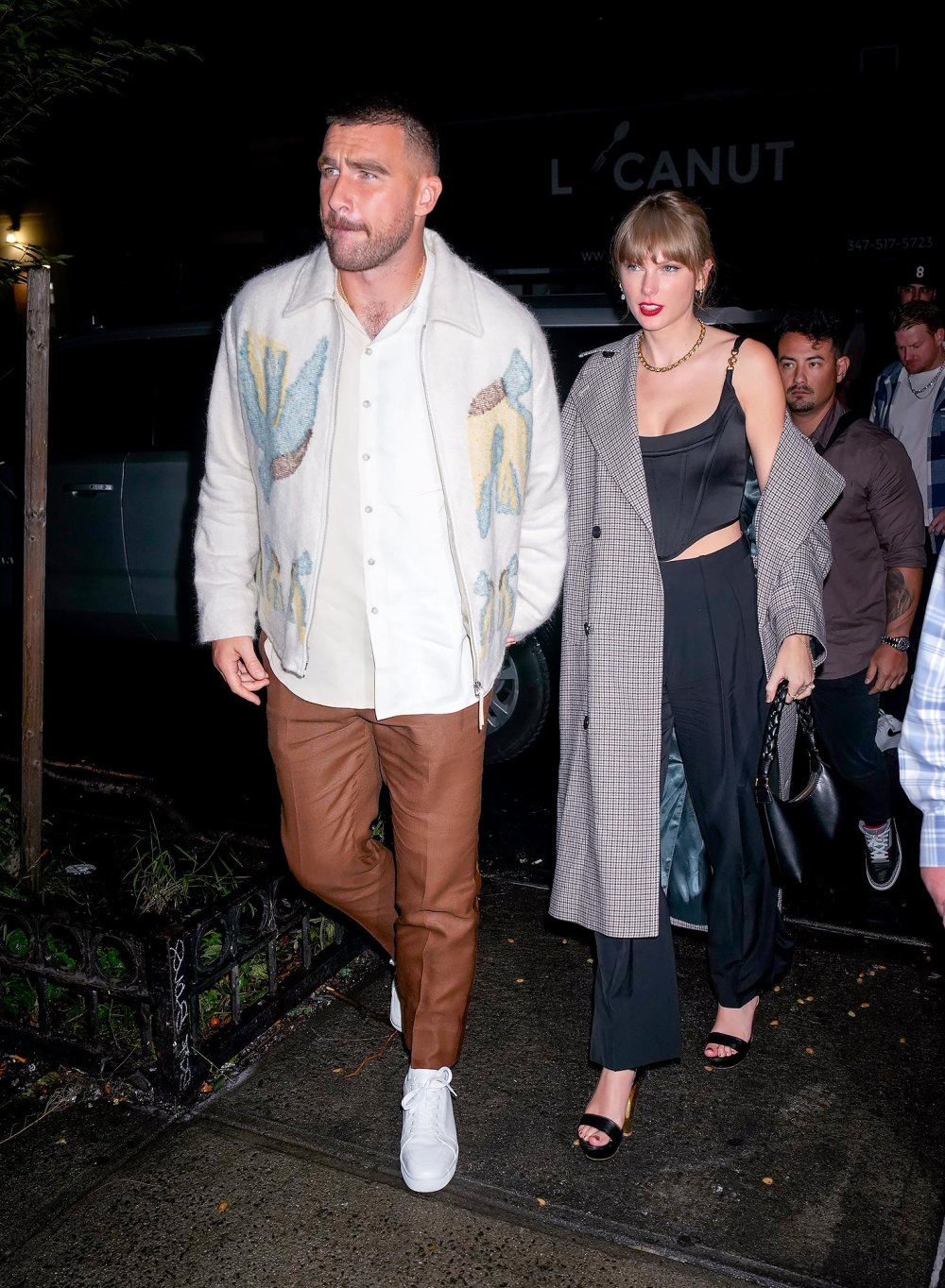 Taylor Swift and Travis Kelce's Friends Think 'They're in Love': 'Heading in That Direction'
