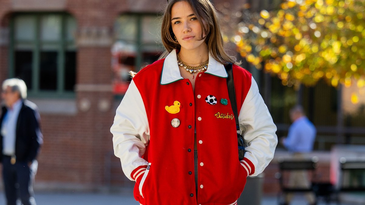 Fashion girl in varsity jacket
