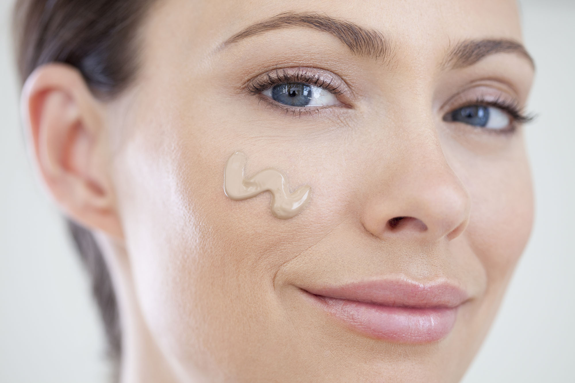 Woman with foundation on her face