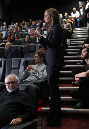 Emma Watson Wears Suit and Cut-Out Bra to ‘We Dare to Dream’ Premiere