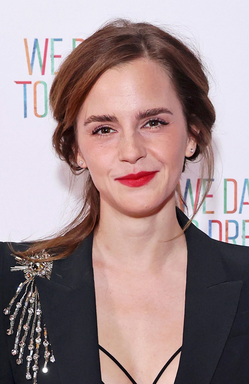 Emma Watson Pairs Cut Out Bralette With Tailored Pantsuit to We Dare to Dream Premiere