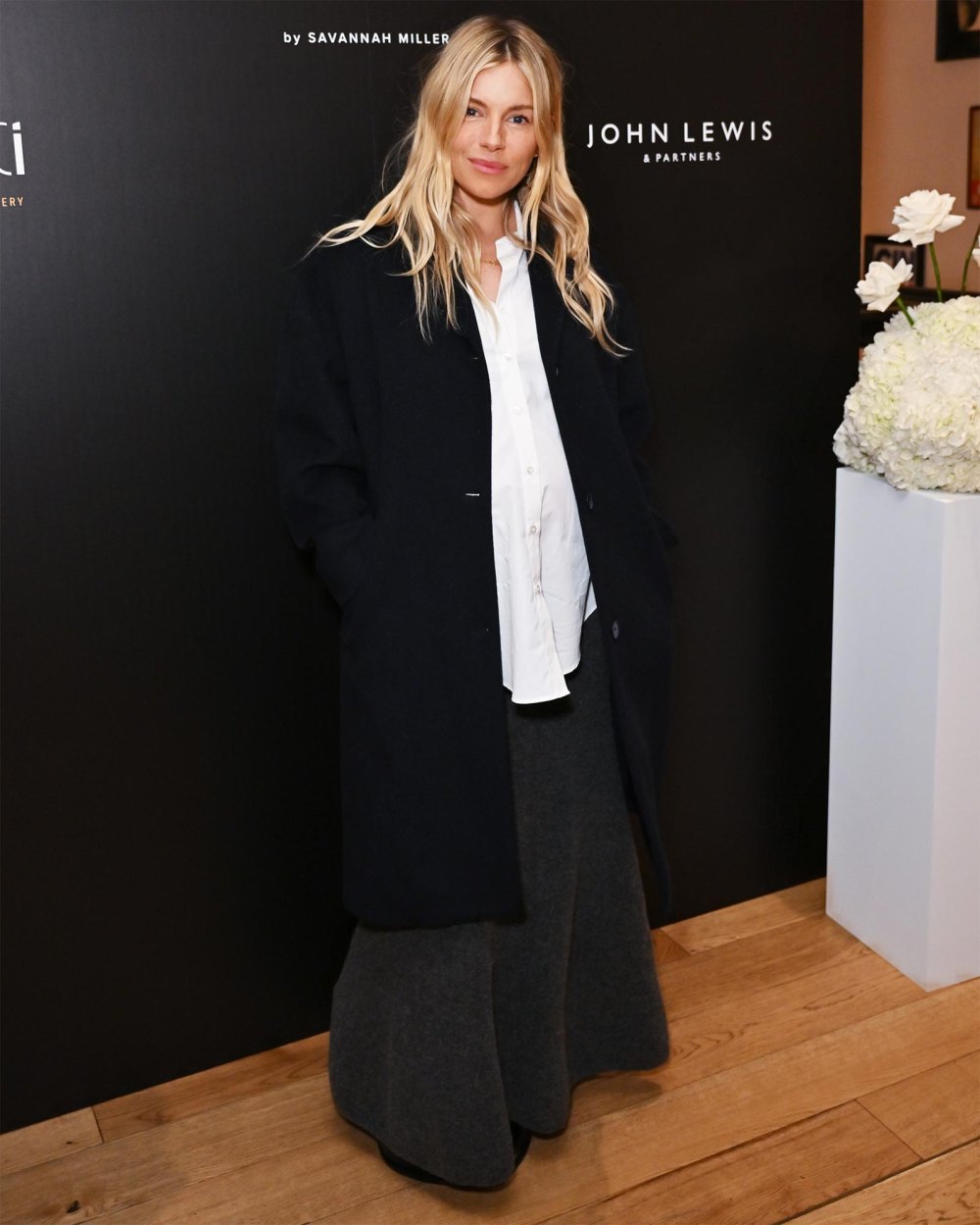 Sienna Miller Stylishly Conceals Baby Bump in Oversized Ensemble