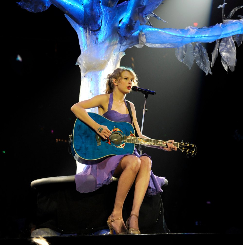 Taylor Swift Drops Koi Fish Pullover That Looks Just Like Her Last Kiss Guitar
