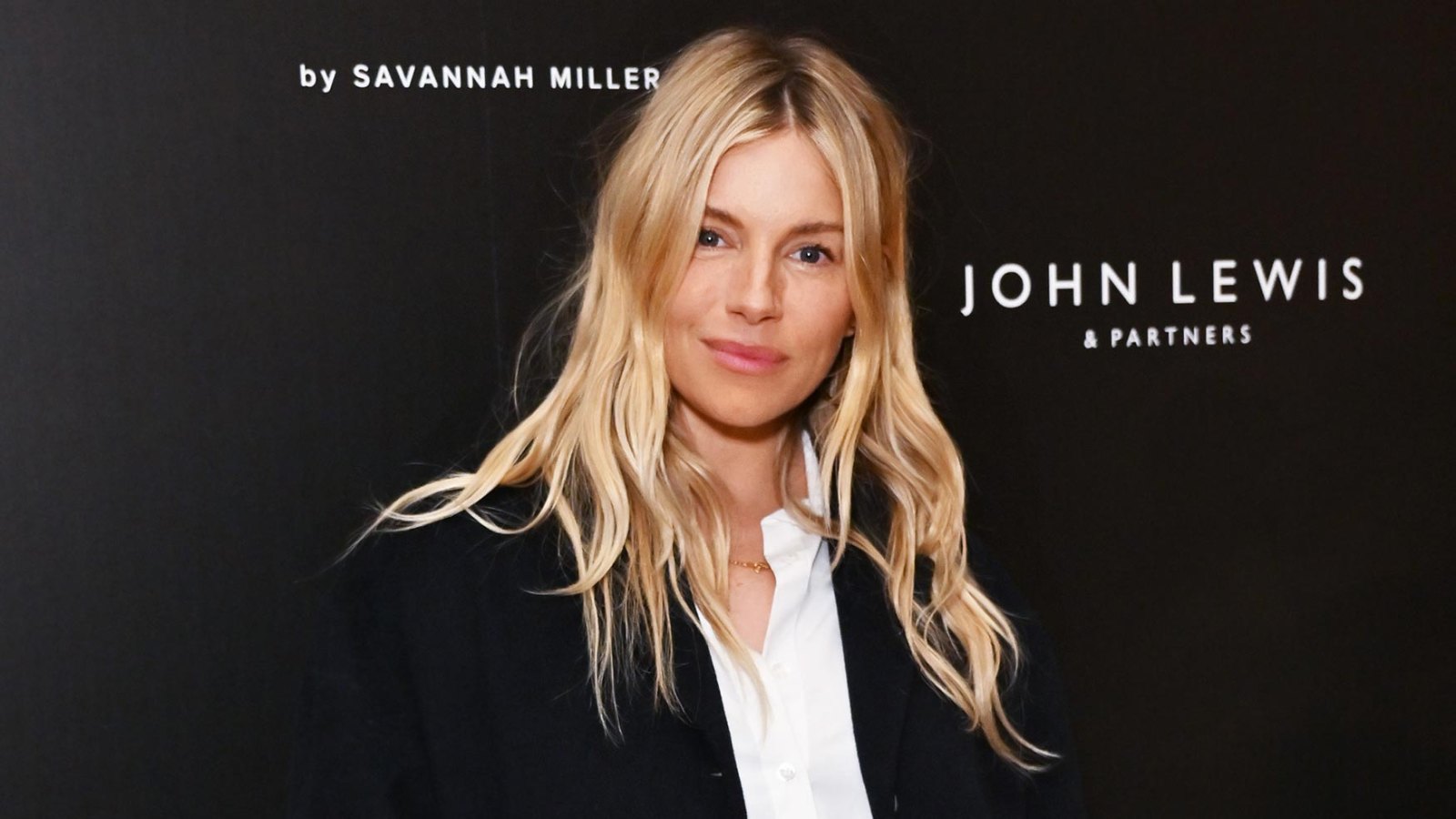 Sienna Miller Stylishly Conceals Baby Bump in Oversized Ensemble