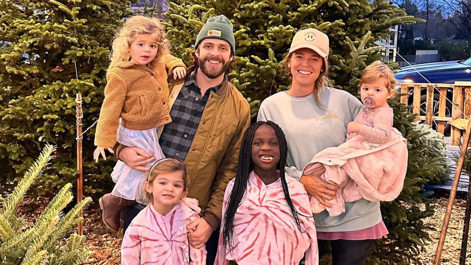 Thomas Rhett and Lauren Akins Have the Perfect Solution to Get Kids to Smile for Holiday Card Shoot
