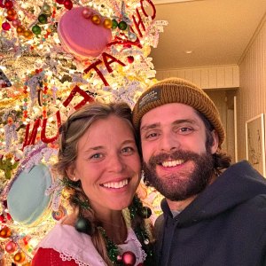 Thomas Rhett Can't Stop Laughing Over Wife Lauren Climbing Ladder to Decorate Tall Christmas Tree