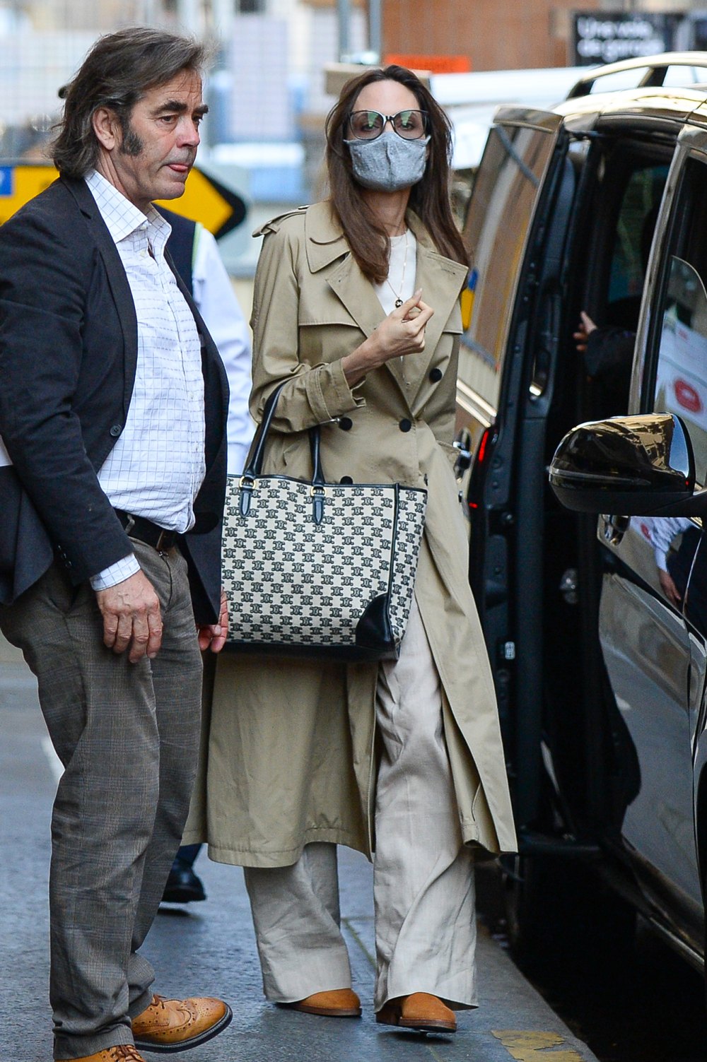Angelina Jolie Says Daughter Jokes She Wears Too Many Trench Coats
