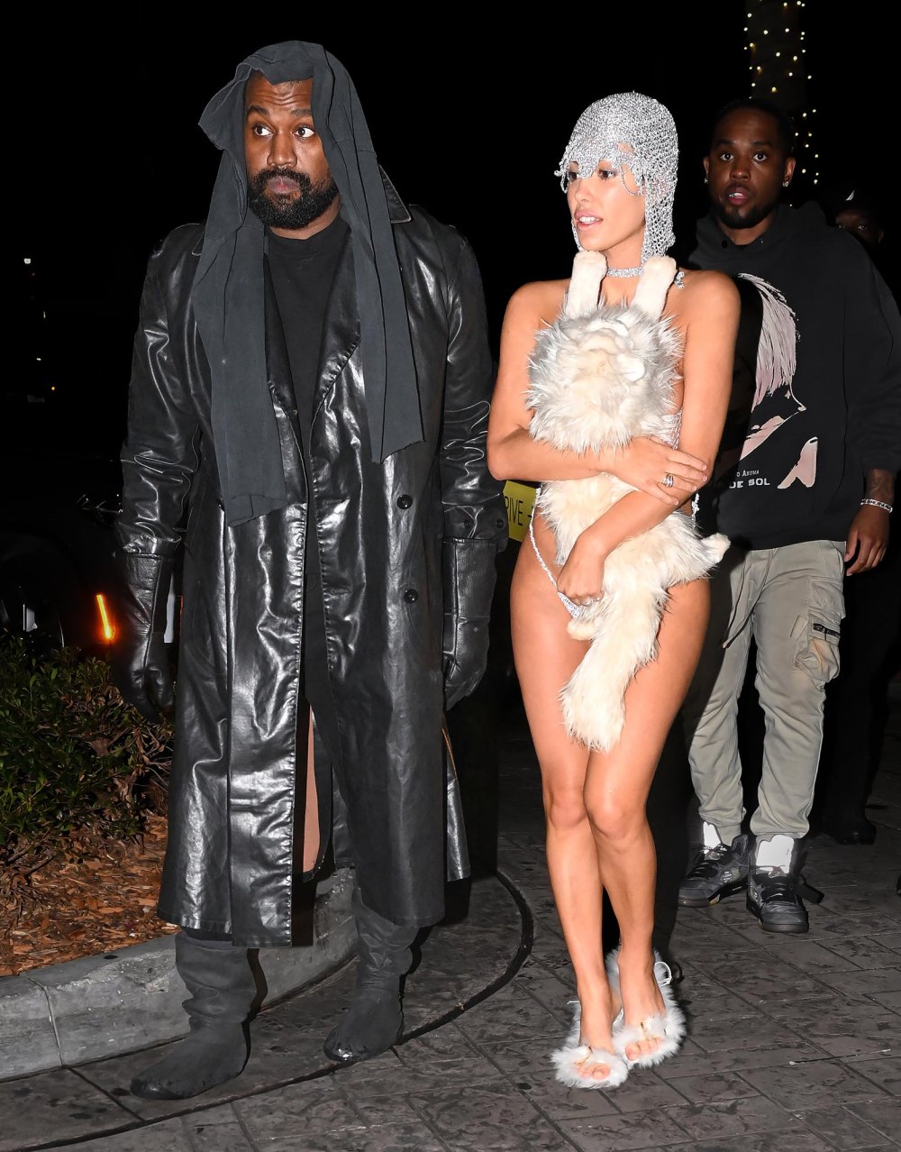 Bianca Censori Covers Up Silver String Set With Stuffed Cat While Out With Husband Kanye West