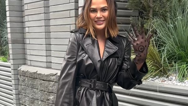 Chrissy Teigen Goes Pantless Under Leather Trench Coat for Christmas Outing in NYC