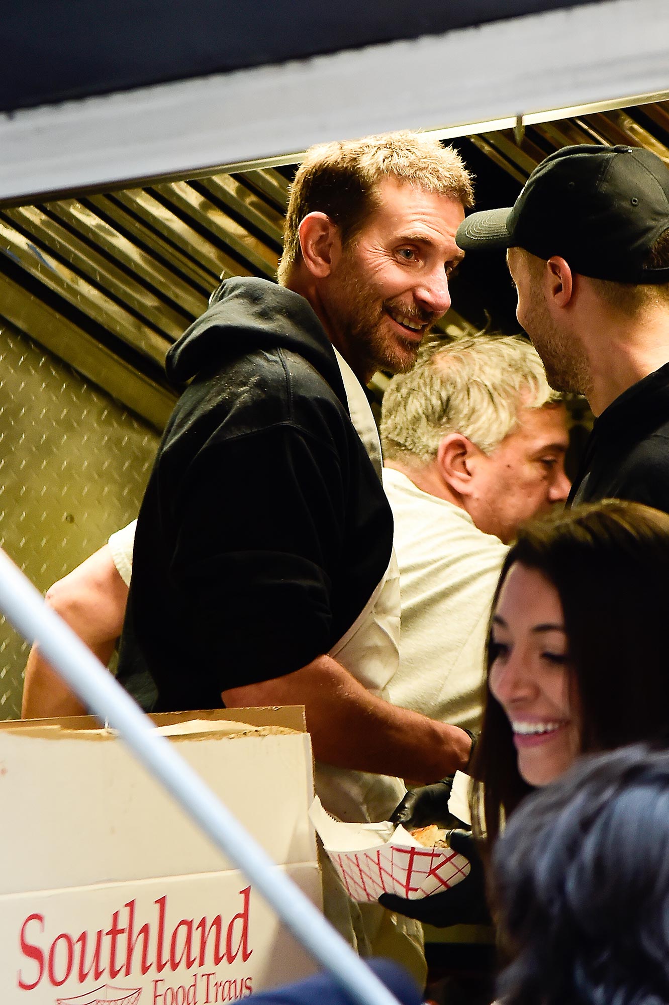 Gigi Hadid Visits Bradley Cooper's NYC Food Truck While He Serves Cheesesteaks