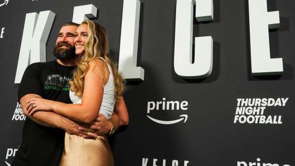 Jason Kelce poses for a photo with Kylie Kelce during the Kelce documentary premiere