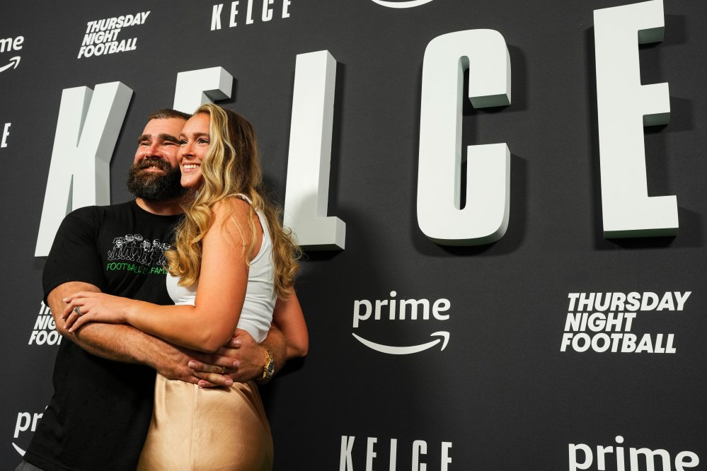 Jason Kelce poses for a photo with Kylie Kelce during the Kelce documentary premiere