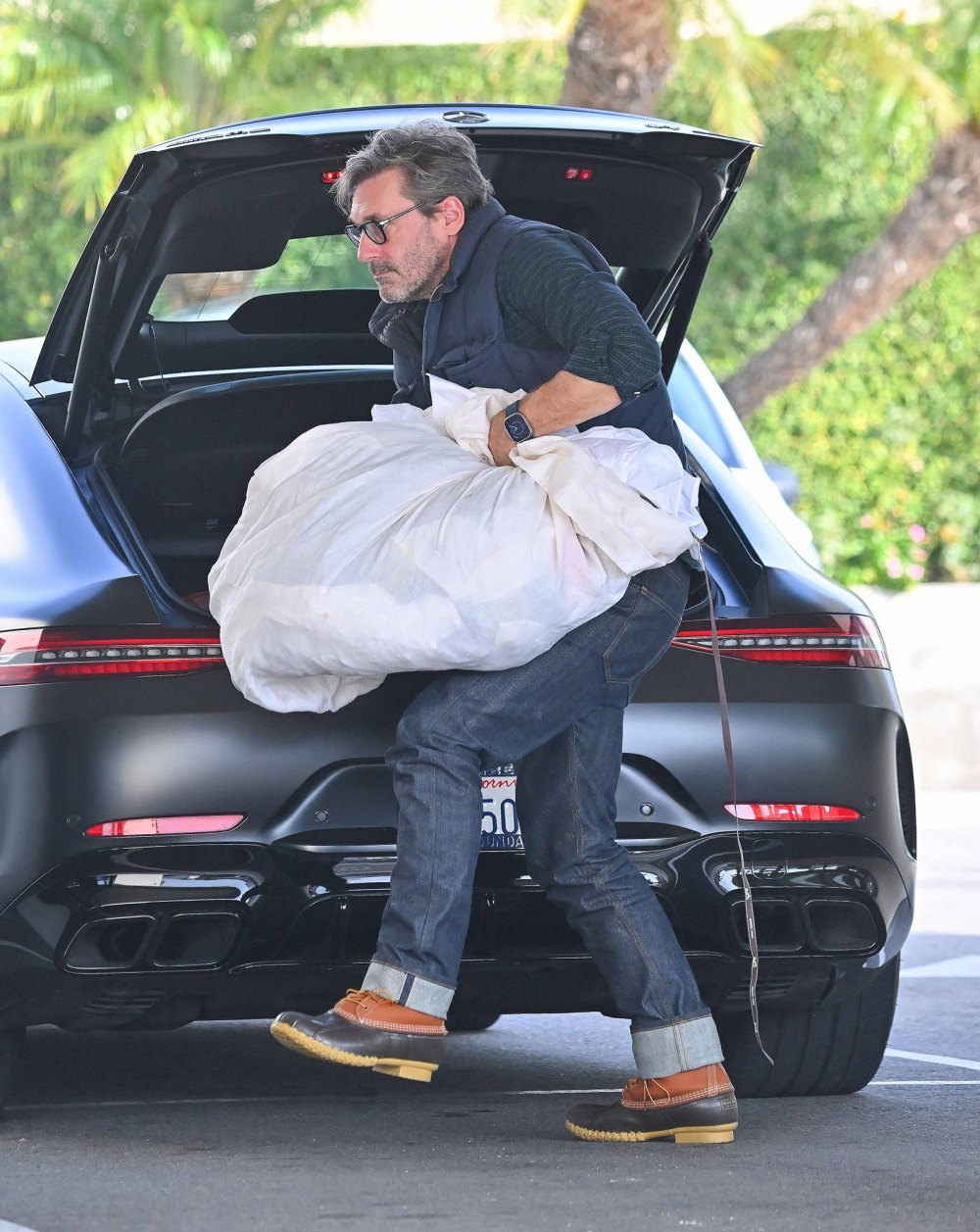 Jon Hamm Is a Mood Trying to Carry His Dry Cleaning Getting His Nails Done