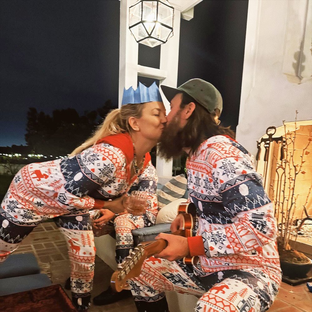 Kate Hudson Lays a Kiss on Danny Fujikawa While Matching in Festive Christmas Pajamas