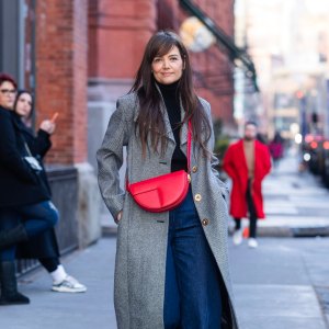 Katie Holmes Adds a Pop of Festive Red to a Neutral Winter Outfit
