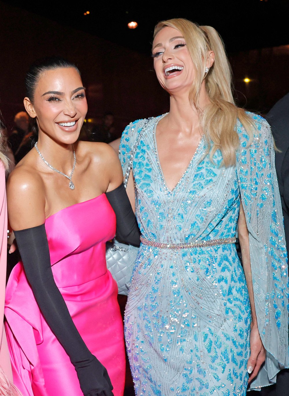 Kim Kardashian and Paris Hilton Go Sledding in Gowns at Epic Holiday Bash