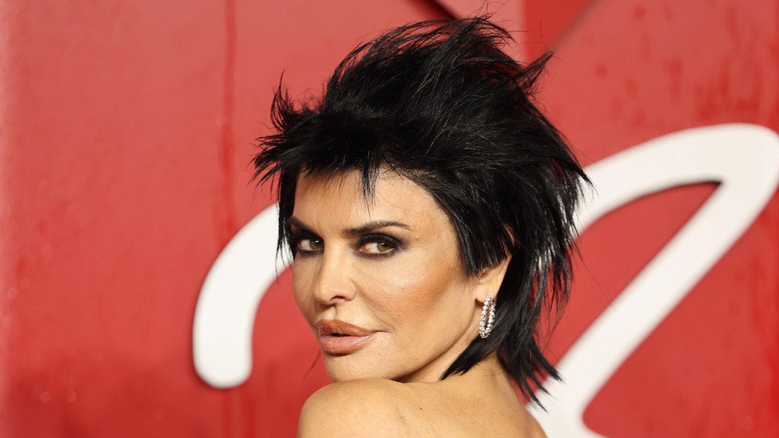FEATURE Lisa Rinna Serves Grunge Glamour in Black Spiky Dress at the 2023 British Fashion Awards