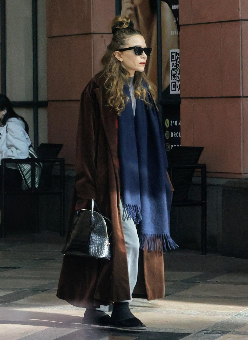 Mary Kate Olsen Steps Out in Understated Dressing Outfit During Rare Outing
