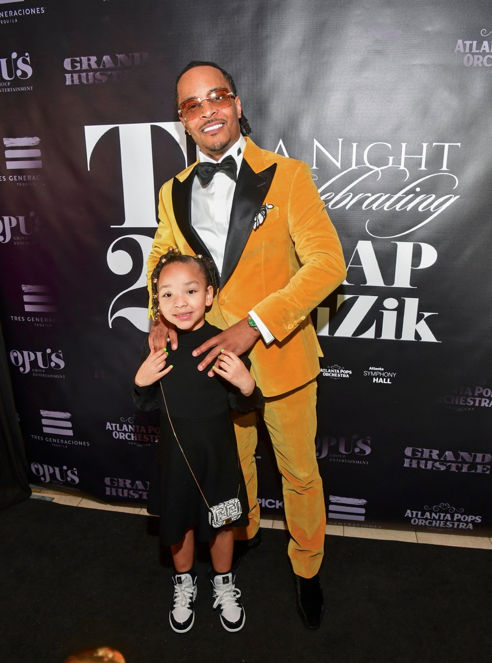 T.I. and Daughter Heiress Adorably Sing Together at 20th Anniversary of Trap Muzik Celebration