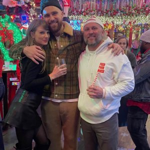 Taylor Swift Adorably Wears Trav Bracelet at Holiday Party With Travis Kelce