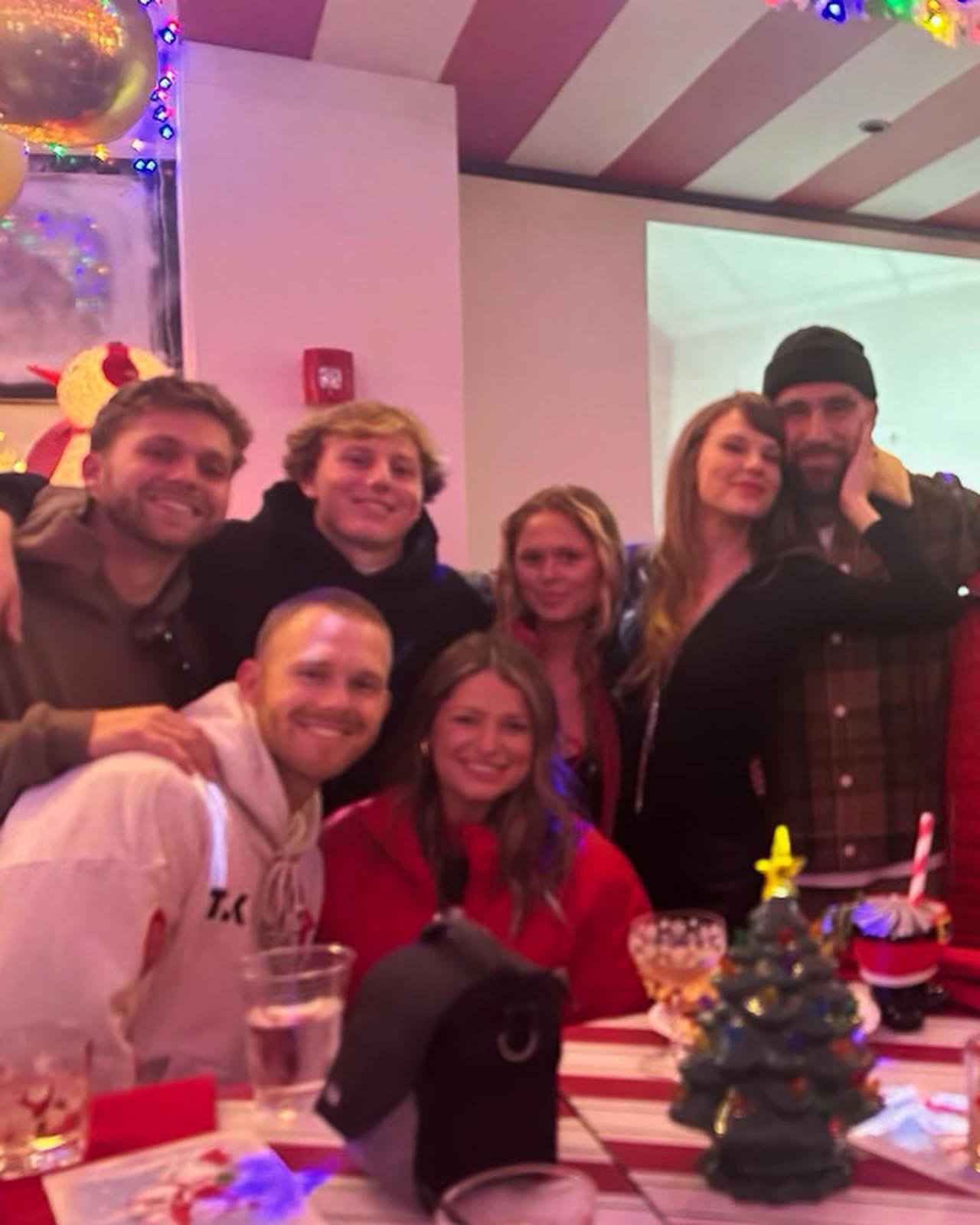 Taylor Swift, Travis Kelce Share Kiss at Christmas Bar in Kansas City ...