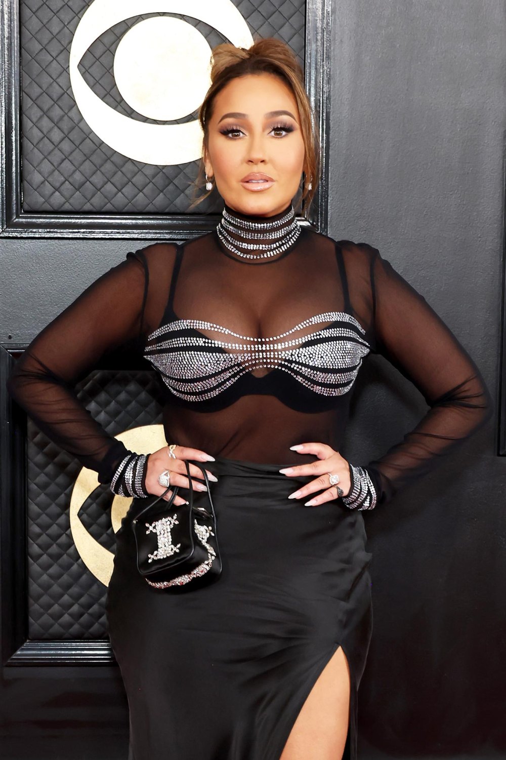 Adrienne Bailon Calls Plastic Surgery Accusations The Greatest Compliment After Posing in Bikinis