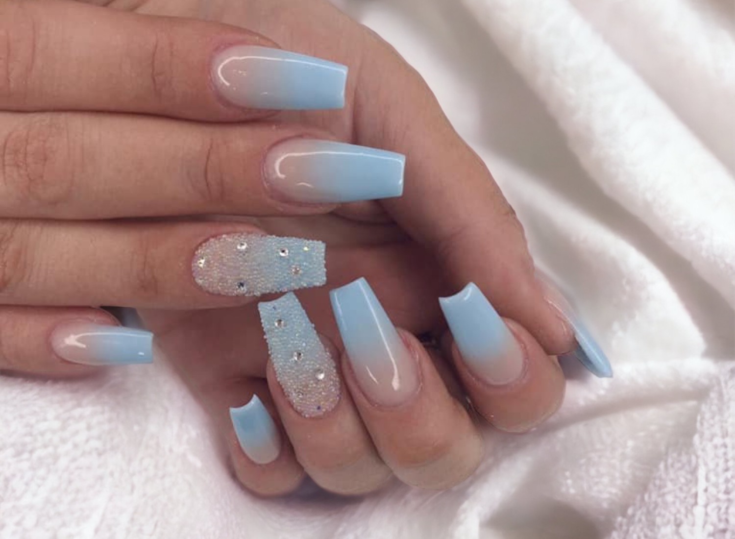 Woman wearing press-on nails