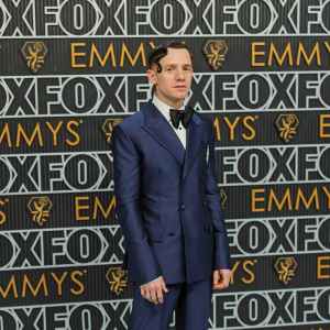 Chris Perfetti Sports Artfully Gelled Hair and a Sharp Navy Suit at the 2023 Emmys