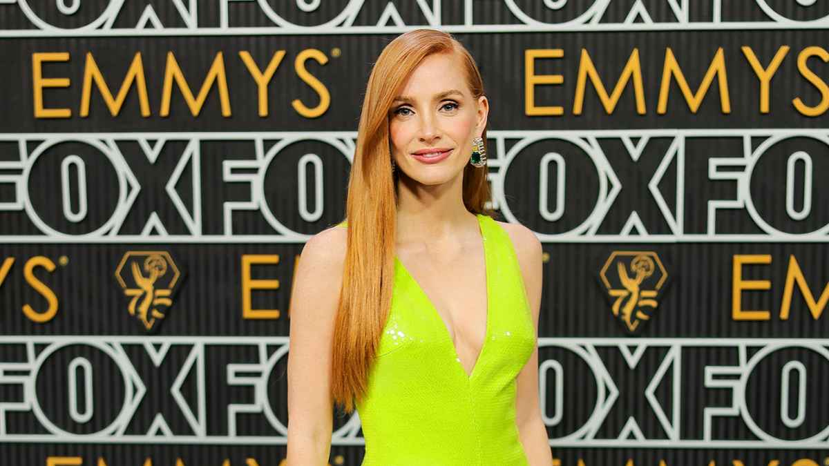jessica chastain green dress Jessica Chastain wearing custom Gucci emerald silk lam draped gown and Gucci Jewelry to the 2022 Vanity Fair Oscar Party holding her Best Actress award for the movie The Eyes of Tammy