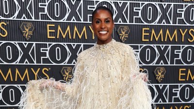 Issa Rae twirls in a beaded and feathered gown at the 684 Emmys