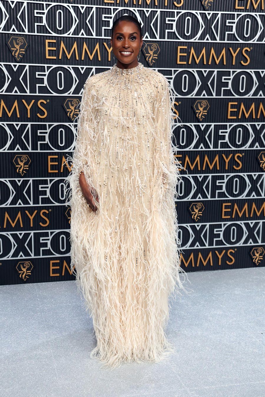 Issa Rae Spins in Beaded and Feathered Embellished Gown at the Emmys 686