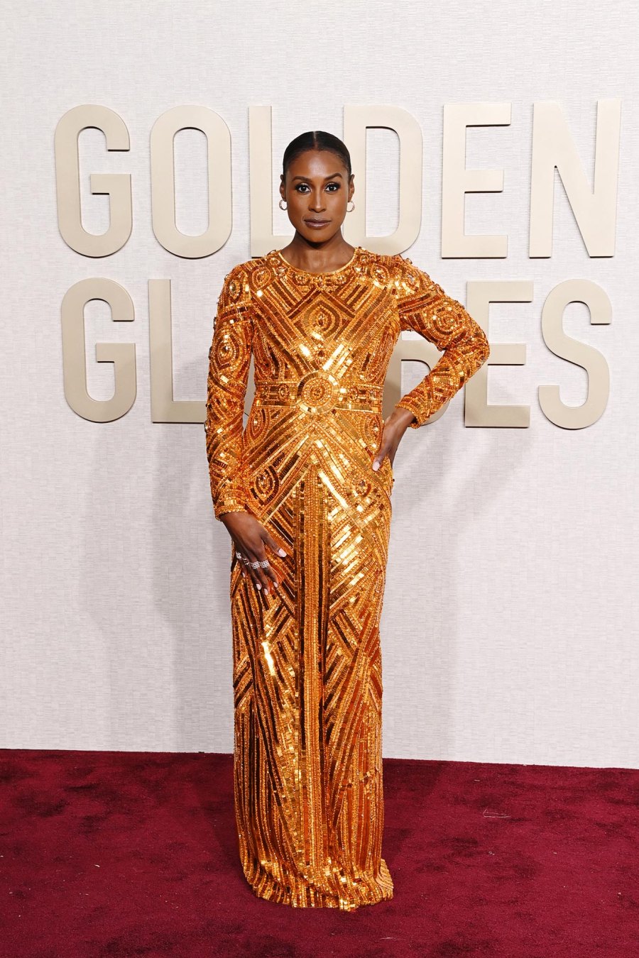 Issa Rae Spins in Beaded and Feathered Embellished Gown at the Emmys 687