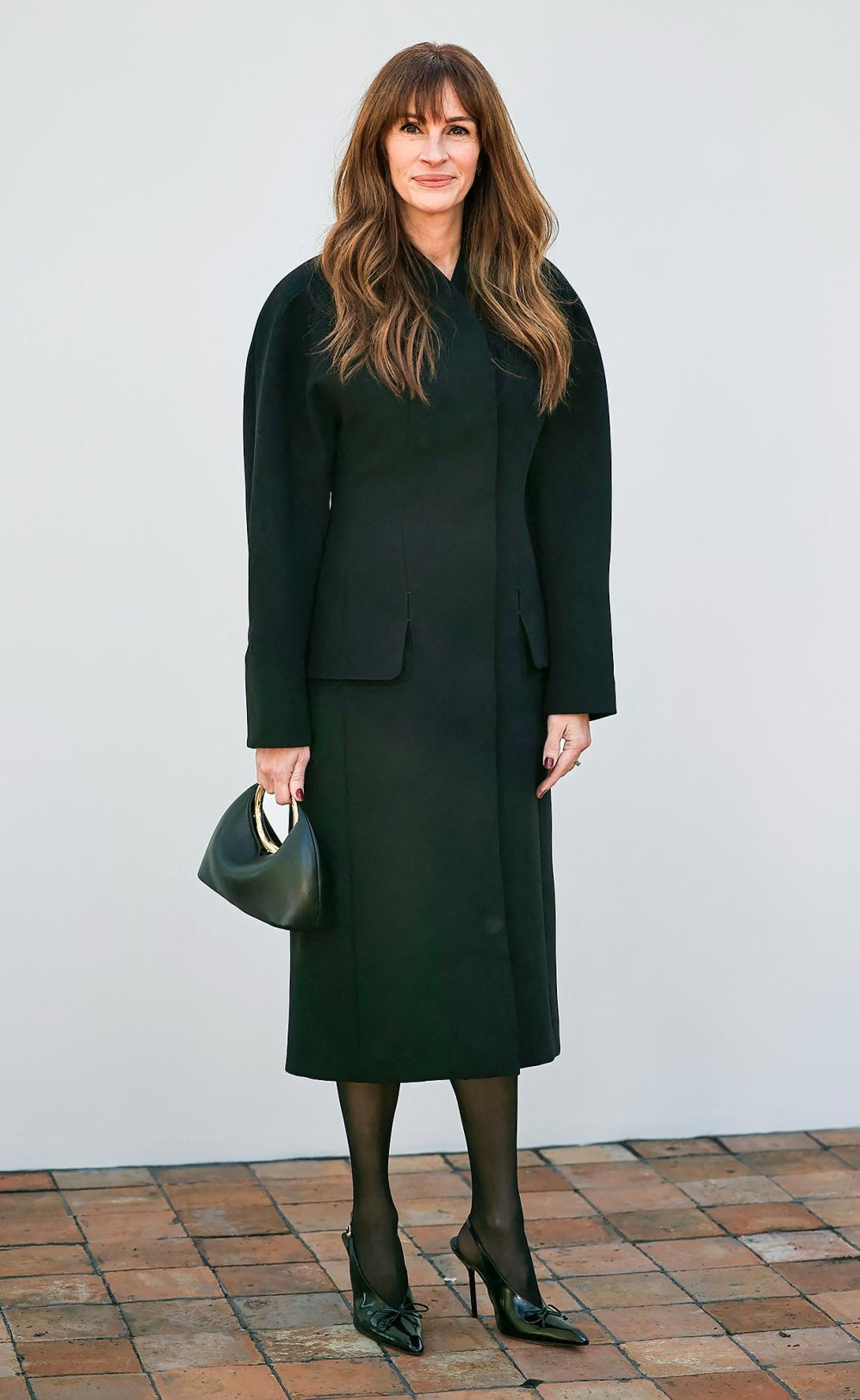 Julia Roberts Looks Sleek in Black Coat Dress at Jacquemus Fashion Show