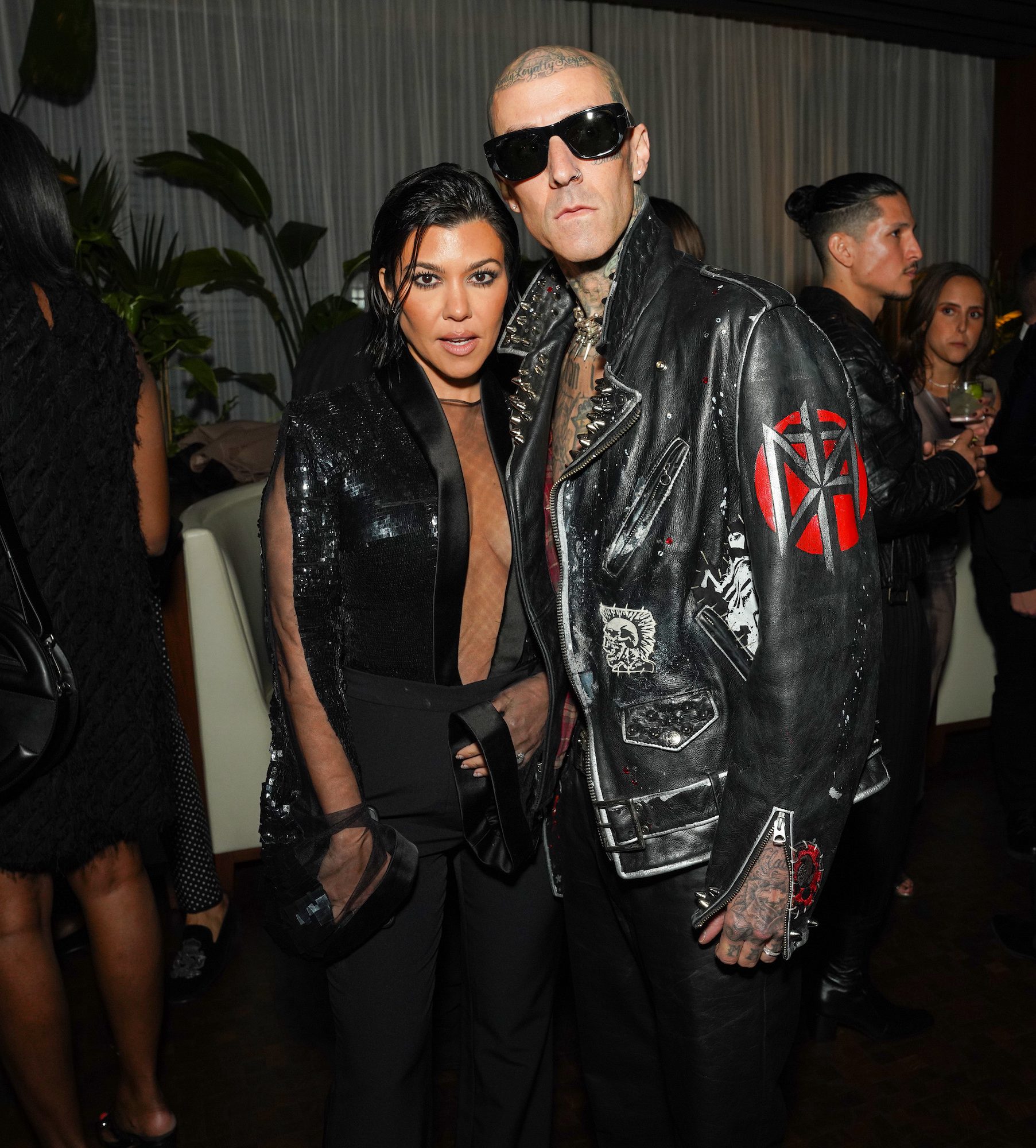 Kourtney Kardashian Cheers on Travis Barker During New Year s Half Marathon