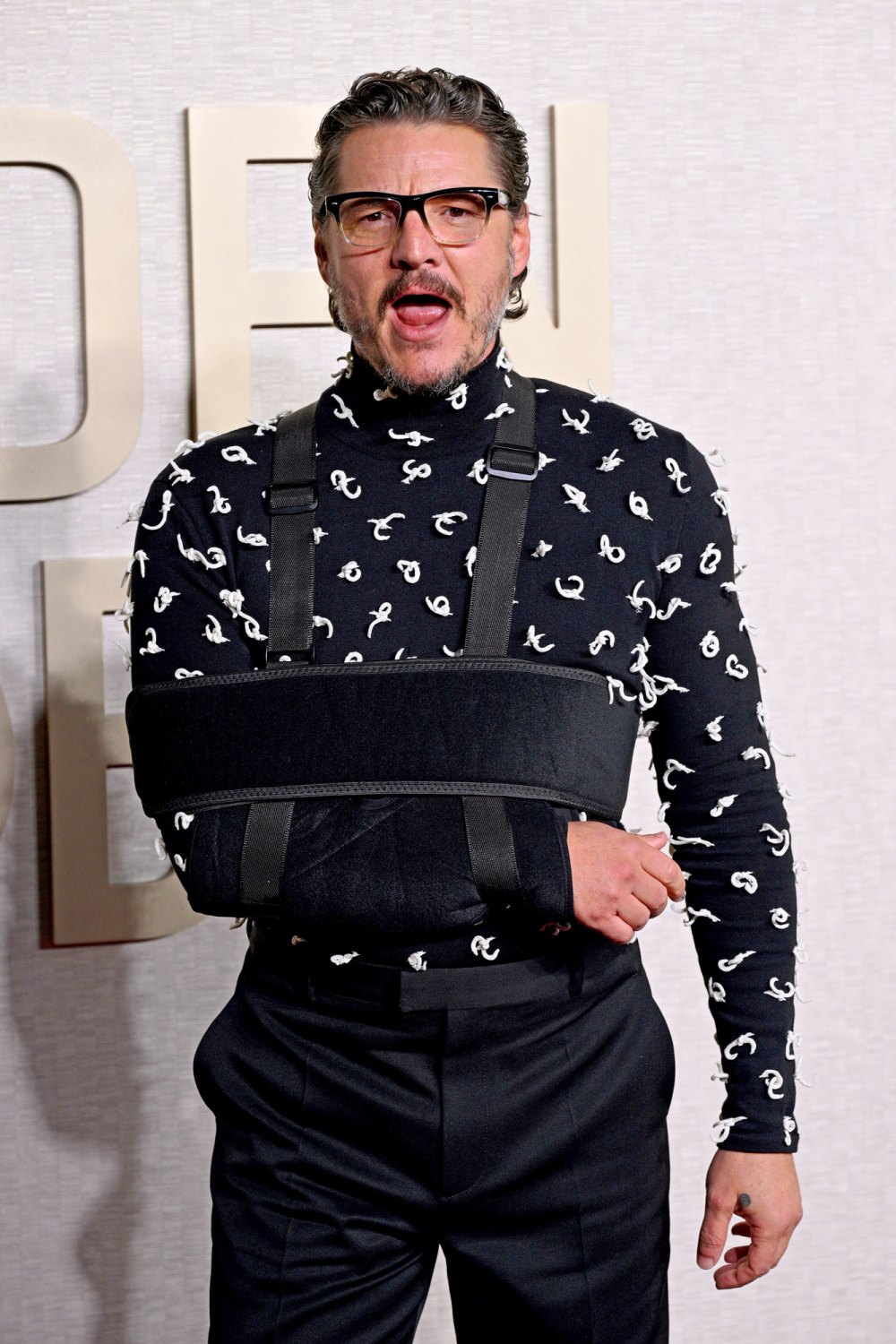Pedro Pascal Had Hidden Message About His Arm Injury With Golden Globes Outfit