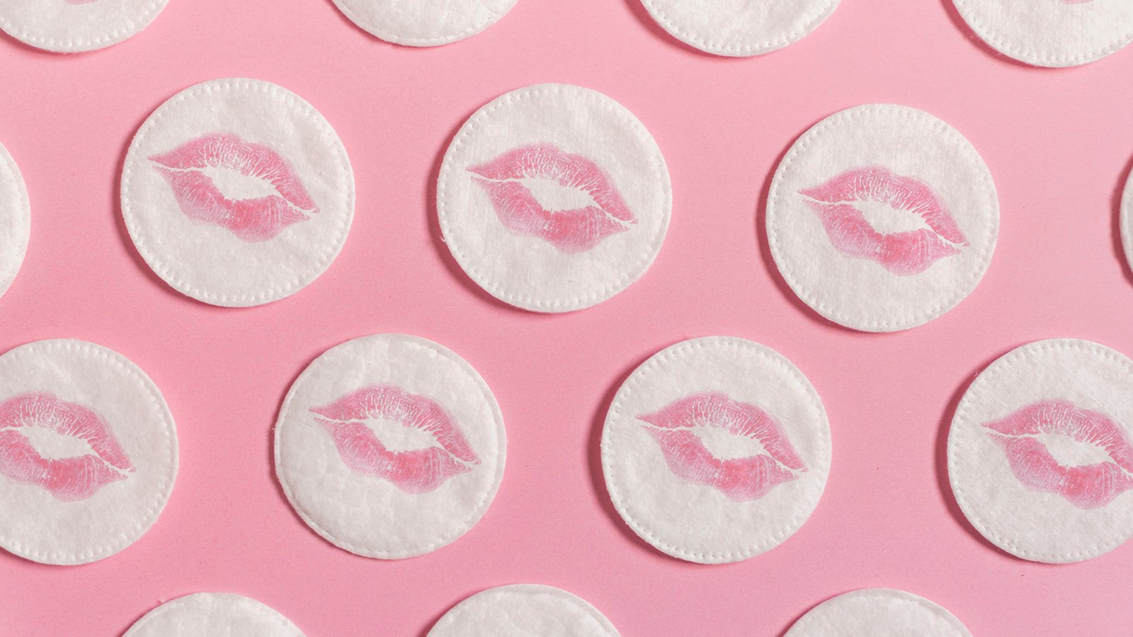 The cottons have marked lips. Concept of femininity, beauty, body care...