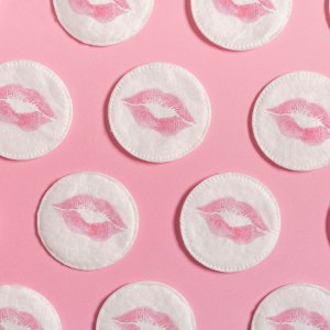 The cottons have marked lips. Concept of femininity, beauty, body care...