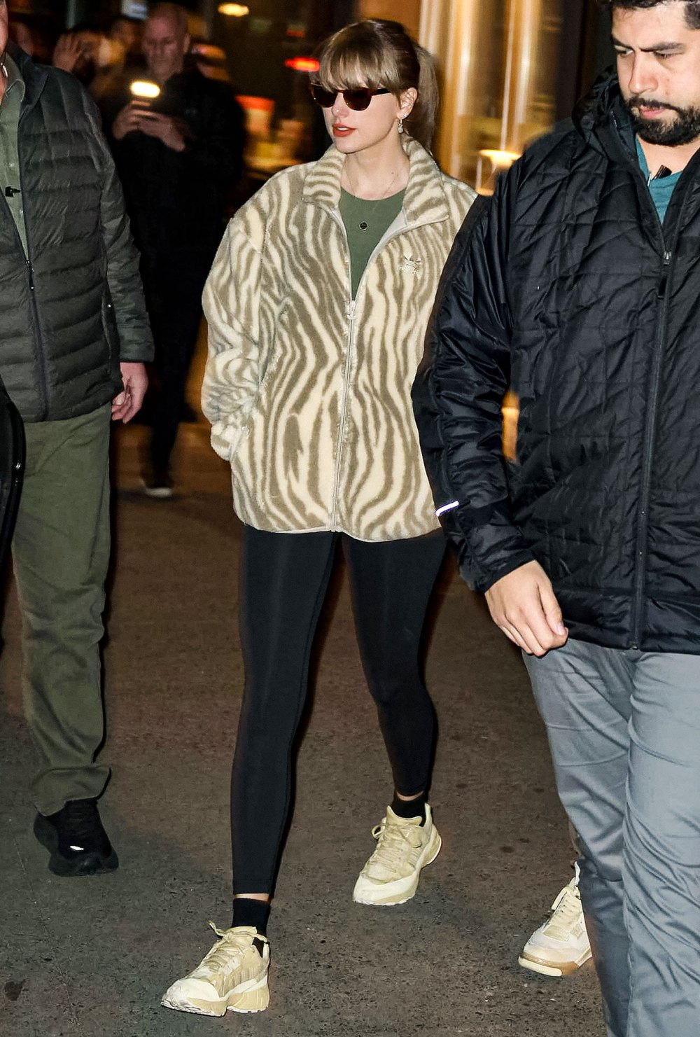 Taylor Swift Is Casually Chic in Zebra-Print Fuzzy Jacket During New York City Outing