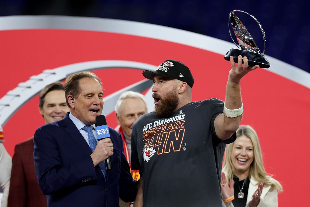 Travis Kelce with Lamar Hunt Trophy after winning AFC Championship