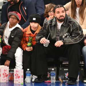 Drake and Son Adonis Sit Courtside at New York Knicks Game