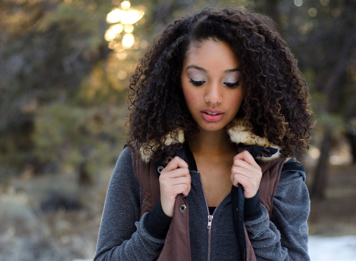 Woman wearing a sweater vest